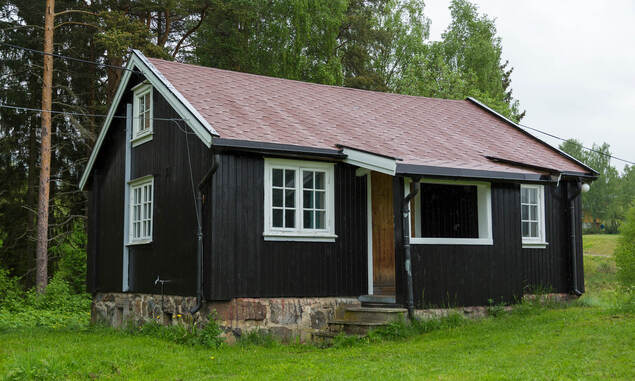 Bilde av Gamlestua, en liten hytte separat fra hovedhuset på Nordtangen.